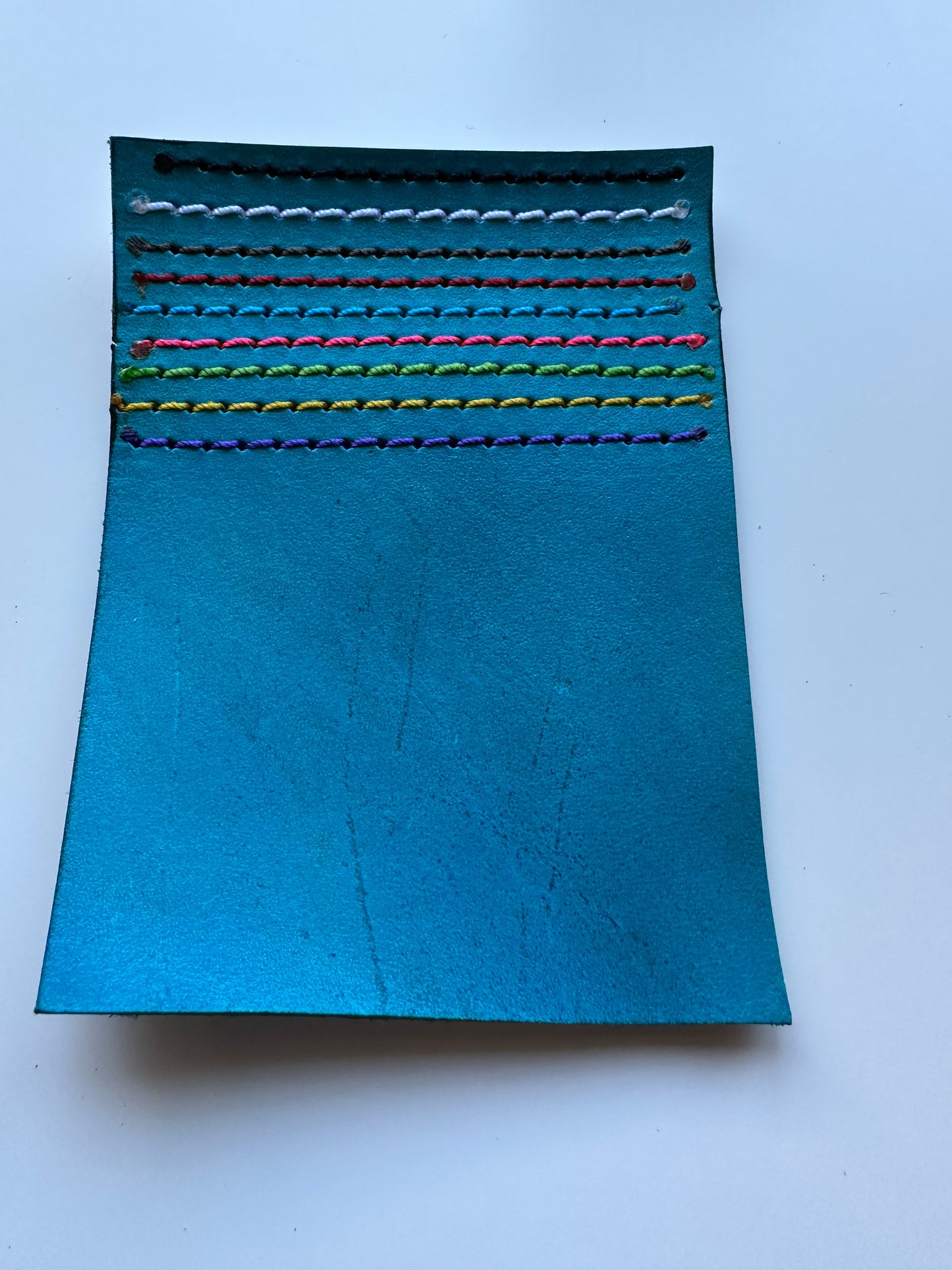 Lined | In Turquoise | The Wearable Wallet